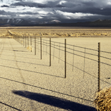 Dixie Valley fence line shadows across salt flats in Nevada tumbleweed great basin